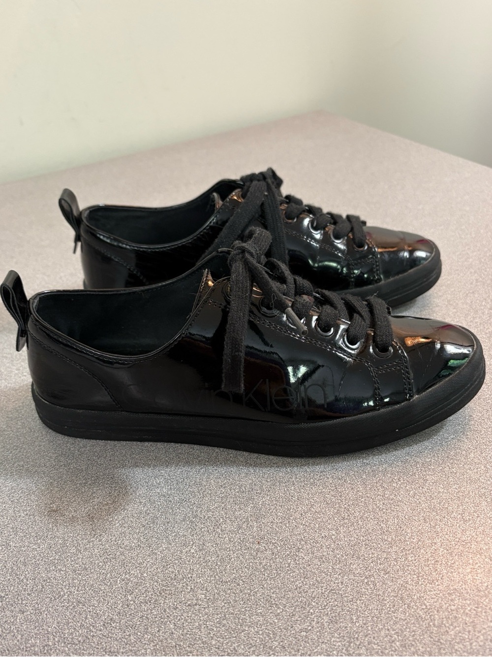 Calvin Klein Moneta Glossy Black Patent Lace-Up Sneakers